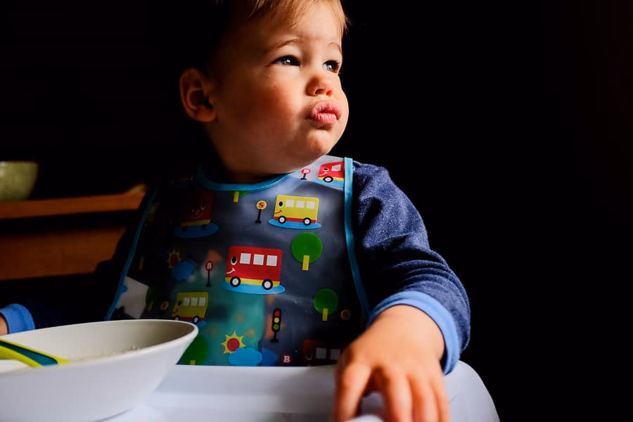 A child photographed in close-up, capturing genuine expression and detail